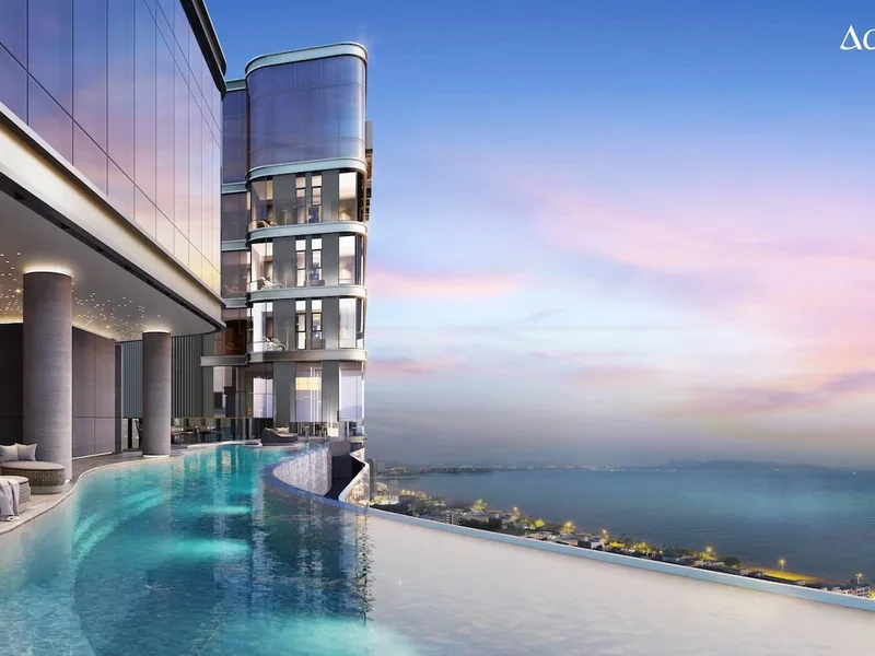 Architectural render of an elevated pool at dusk at Aquarous Jomtien Pattaya, Pattaya