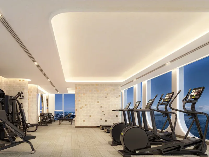 Architectural render of a gym with large windows at PTY Residence Sai 1, Pattaya