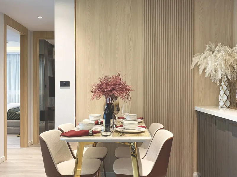 A dining area beside the kitchen in the Pristine Park III show unit, Pattaya